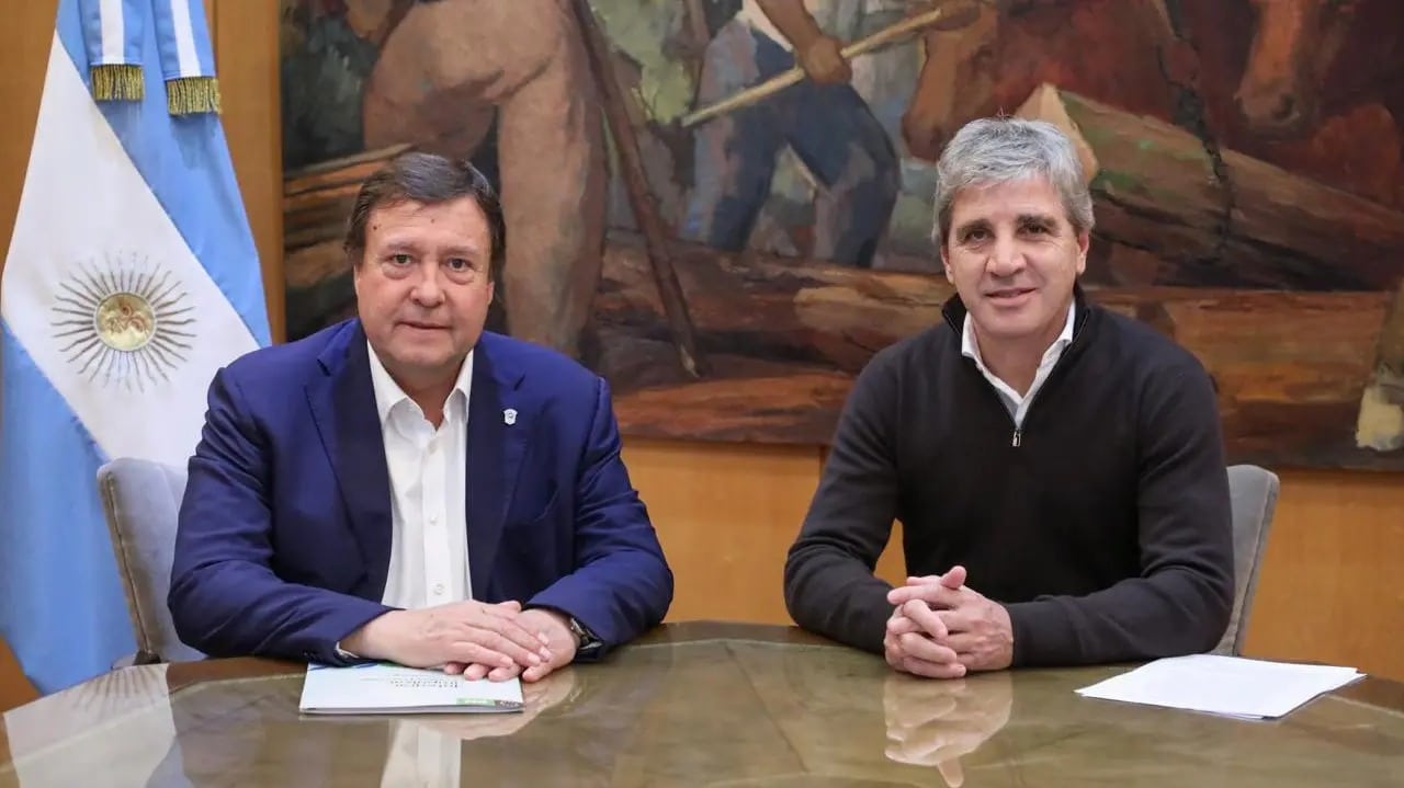 Weretilneck y Luis Caputo